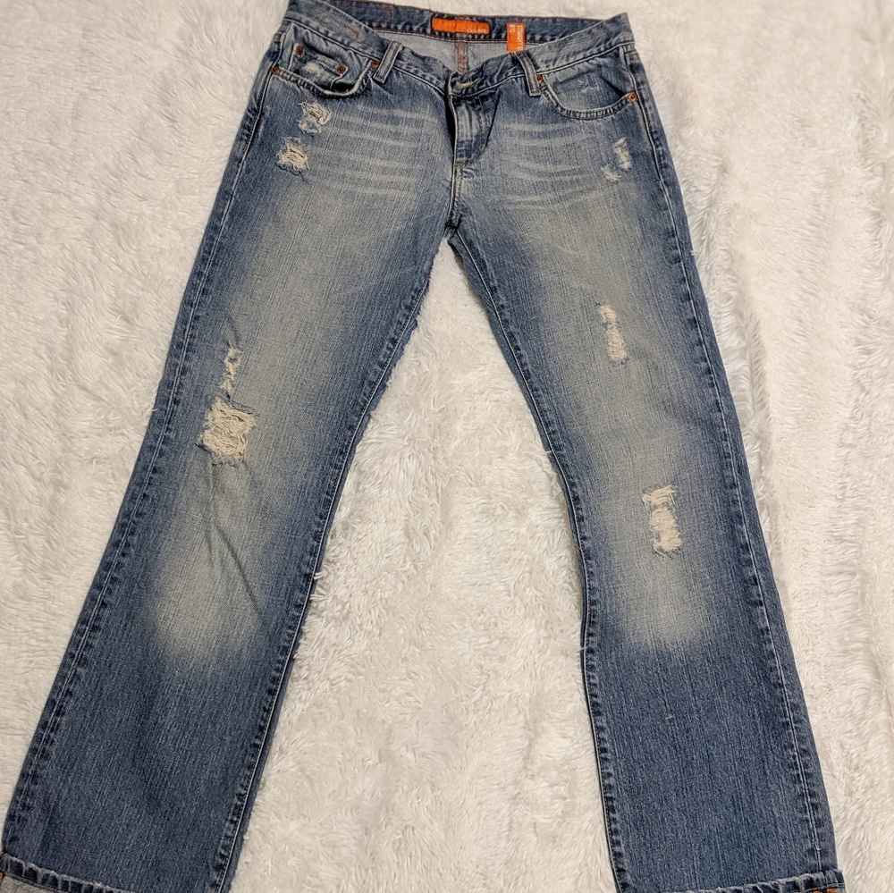 Straight leg slightly distressed medium wash jeans
